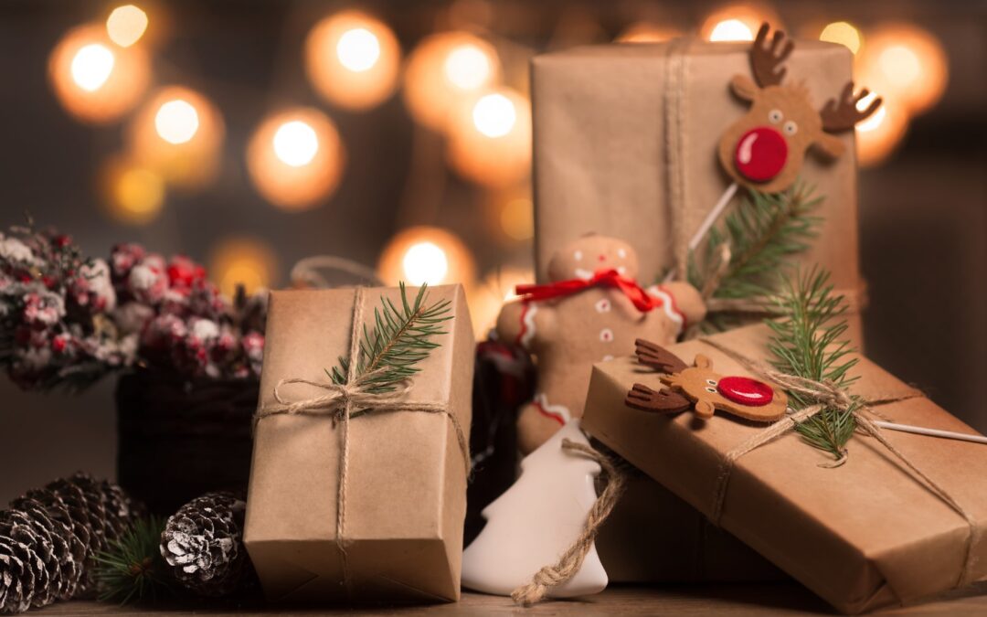 Christmas Gifts with Lights in the Background for a family enjoying a Christmas in Manistee getaway.