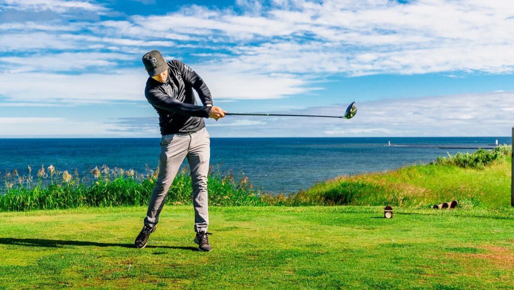 MAN ON GOLF COURSE IN MANISTEE
