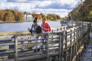 walking around town and over bridge in fall in manistee mi